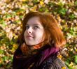 Portrait of the girl in autumn