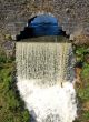 Waterfall flow from the castle wall