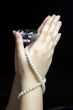 Diamond on praying hands