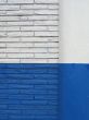 blue and white brick wall