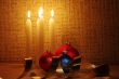 candles, balls and gold ribbons it are Christmas