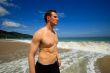 Man standing on exotic beach