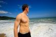 Man standing on exotic beach