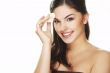 young woman with cosmetic petal