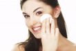 young woman with cosmetic petal