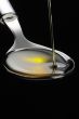 olive oil on a spoon