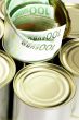 euro bills on a tin can