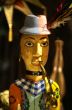 Wooden doll with a pipe