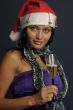 beautiful woman drinking champagne into Christmas