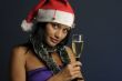 beautiful woman drinking champagne into Christmas