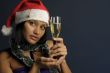 beautiful woman drinking champagne into Christmas