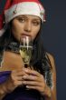 beautiful woman drinking champagne into Christmas