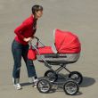 Woman with baby carriage