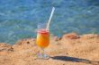 fresh juice orange and papaya on the beach of the sea_3