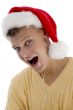 cool man with christmas hat and canal phone