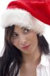 close up of woman wearing christmas hat