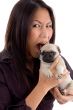 shouting female holding puppy
