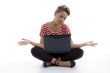 sitting woman holding laptop