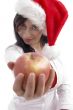 sexy model with christmas hat showing apple