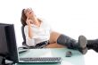 pleased woman sitting in office