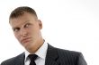 close up of handsome businessman looking upward
