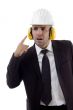 male engineer wearing earplugs