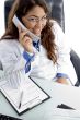 female doctor talking on phone