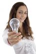 young female showing light bulb