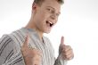 handsome man showing thumbs up