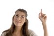 close up view of beautiful woman pointing upwards
