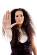 beautiful woman posing with stopping palm