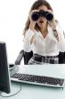 woman in office and looking through binocular
