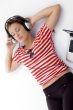 laying woman listening music