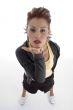standing glamorous female sending a kiss
