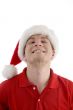 squint male wearing christmas hat