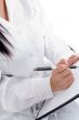 medical professional writing prescription
