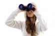 attractive model watching through binocular