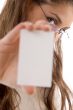 young businesswoman showing business card