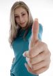 smiling woman showing approval sign