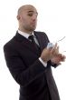 young corporate man wiping off his eyeglasses