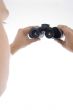 man holding binoculars