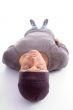 man lying on his back and looking at camera