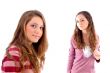 beautiful girls standing in front of camera