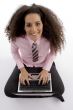 beautiful young businesswoman working on laptop