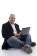 experienced businessman working on laptop