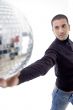 man holding disco ball