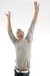 smiling man stretching his arms