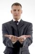 businessman showing begging gesture