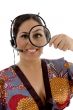 japanese female looking through magnifying lens