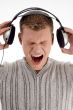 shouting young man holding the  headphone